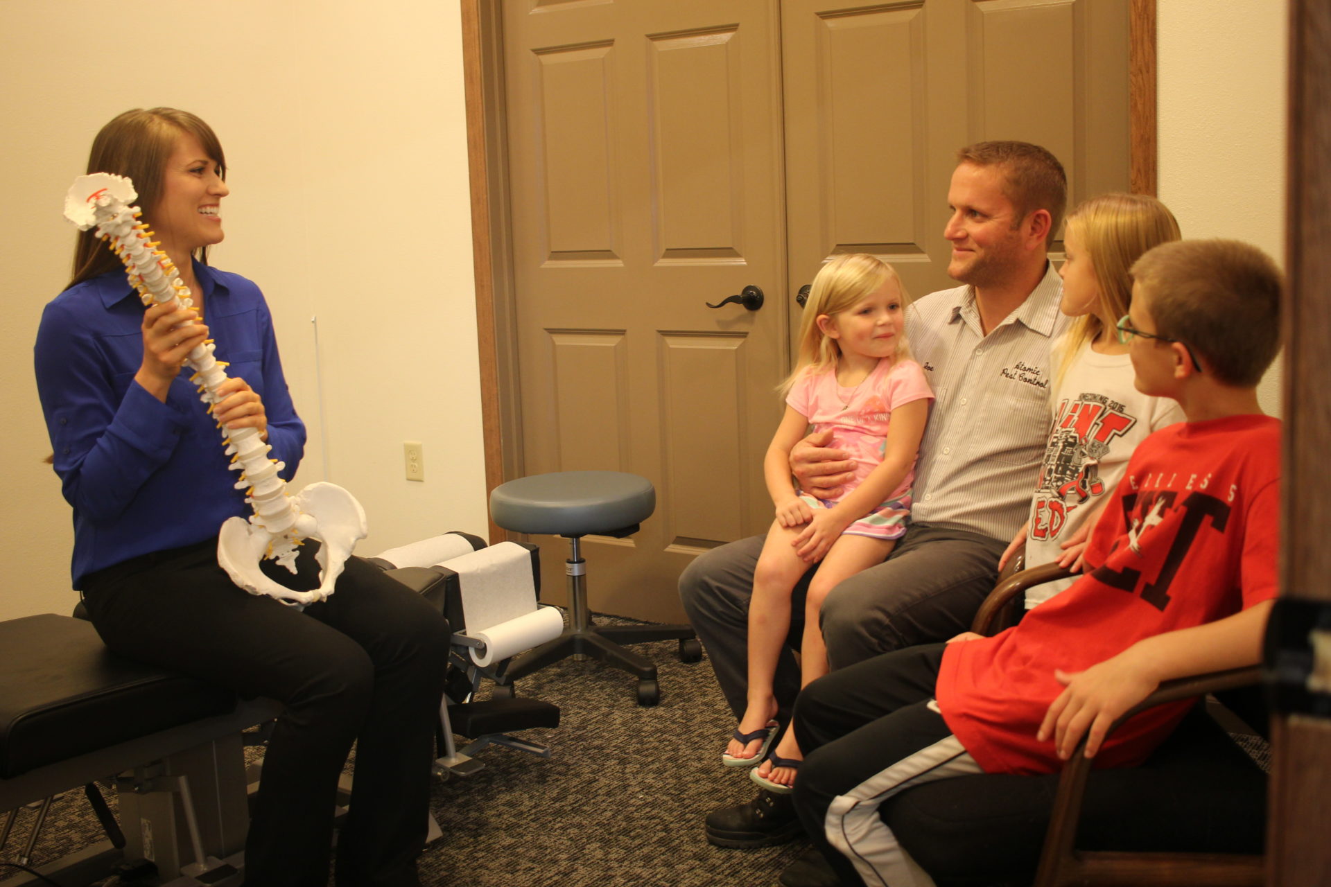 Doctor-presenting-to-family